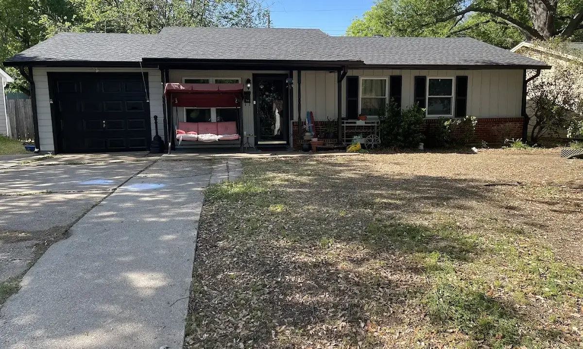 Asphalt Shingle Roof Repair crew at work on a residential roof in Cibolo